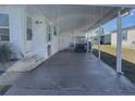Spacious carport providing ample covered parking and storage at 346 Mariner Dr, North Port, FL 34287