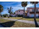 Lovely two-story home with garage, balcony and lovely tile roof at 500 Nassau S St, Venice, FL 34285