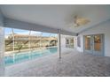 Screened pool and patio area with tile floors at 5891 Madison Rd, Venice, FL 34293