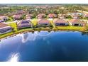 Luxury home with a lake view in a quiet community at 13376 Caravaggio Ct, Venice, FL 34293