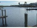 Picturesque waterfront community with docks and serene water views, perfect for boating enthusiasts at 242 Blackburn Blvd, North Port, FL 34287