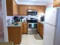 Well-equipped kitchen with stainless steel appliances at 562 Longwood Dr, Venice, FL 34285