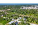 A home in a secluded, woodsy area at 1449 Overhead St, North Port, FL 34288