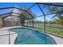 Screened pool with a beautiful lake view at 5194 Layton Dr, Venice, FL 34293