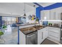 Modern kitchen with stainless steel appliances and dark granite countertops at 16700 Gulf Blvd # 625, North Redington Beach, FL 33708