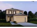 Two-story house with beige exterior, brown roof, and a two-car garage at 0000 Albenga Ln, North Port, FL 34286