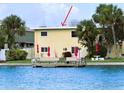 Waterfront home with private dock and lush landscaping at 9715 Harrell Ave # 40, Treasure Island, FL 33706