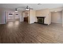 Bright and airy living room with hardwood floors at 272 Algiers Dr, Venice, FL 34293