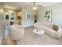 Bright living room featuring a stylish sofa and coffee table at 4185 Barracuda Se Dr, St Petersburg, FL 33705
