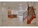 Spacious entryway with tile floors, kitchen and staircase views at 1344 Ribolla Dr, Palm Harbor, FL 34683
