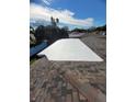 Newly coated flat roof on a residential building at 2587 Blackwood Cir, Clearwater, FL 33763