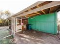 Covered carport area with a side yard at 7256 Pinehurst Dr, Spring Hill, FL 34606