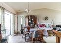 Cozy dining room features a wood table and chairs, with access to the kitchen at 1450 Ward St, North Port, FL 34288