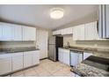 Renovated kitchen featuring white cabinets and granite countertops at 634 Newton S Ave, St Petersburg, FL 33701