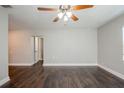 Living room with hardwood floors and an interior hallway at 4675 20Th S Ave, St Petersburg, FL 33711