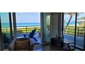 Living area boasts amazing ocean views from private balcony at 420 Gulf Blvd # 101, Indian Rocks Beach, FL 33785