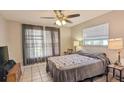 Cozy bedroom with a double bed and plenty of natural light at 152 Clemson Rd, Venice, FL 34293