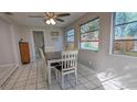 Bright dining area with a table and chairs, plus access to the backyard at 152 Clemson Rd, Venice, FL 34293