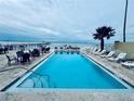 Inviting rectangular pool with lounge chairs at 1420 Bayshore Blvd # 316, Dunedin, FL 34698