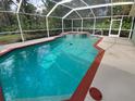 Inviting screened pool with spa and ample deck space at 6826 San Jose Loop, New Port Richey, FL 34655