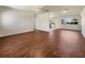 Spacious living area featuring hardwood floors and an open layout at 3944 Nekoosa St, North Port, FL 34287