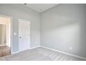 Spacious bedroom with gray walls and carpeted floor at 11223 Spring Gate Trl, Bradenton, FL 34211