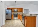 Modern kitchen with stainless steel appliances and granite countertops at 4944 Alseir Rd, North Port, FL 34288