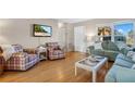 Living room featuring plaid armchairs and a coffee table at 7213 19Th W Ave, Bradenton, FL 34209