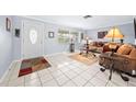 Living room entryway with tiled floors and a view of the living room at 11095 56Th N Ave, Seminole, FL 33772