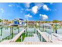 Private boat dock with multiple boat slips at 2600 N Paula Dr # 19A, Dunedin, FL 34698