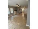 Large living room with tile floors at 3409 E 9Th Ave, Tampa, FL 33605