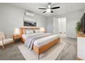 Spacious primary bedroom with large bed and en-suite bathroom at 5339 Brookmeade Dr, Sarasota, FL 34232