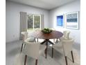 Dining room featuring a round wooden table and six chairs at 1832 Draughton Dr, Zephyrhills, FL 33541