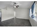 Spacious living room featuring hardwood floors and lots of natural light at 13910 Fullerton Dr, Tampa, FL 33625