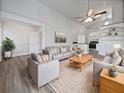 Bright and airy living room featuring a neutral color palette and modern furniture at 3030 46Th W Ave, Bradenton, FL 34207