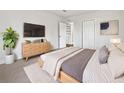 Spacious main bedroom with ample closet space and plush bedding at 3030 46Th W Ave, Bradenton, FL 34207