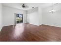 Spacious dining area with hardwood floors and access to kitchen at 3473 Parkridge Cir # 17-101, Sarasota, FL 34243