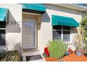 Inviting front entrance with landscaping at 6650 100Th N Way # 25C, St Petersburg, FL 33708