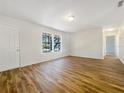 Spacious living area with hardwood floors and an open floor plan at 5220 Lords Ave, Sarasota, FL 34231