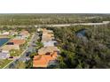 Bird's eye view of homes in a scenic neighborhood, with beautiful landscaping and proximity to a serene river at 6977 74Th Street E Cir, Bradenton, FL 34203