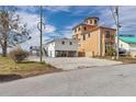 Beautiful beach house with parking and outdoor amenities next to another larger home at 6417 Driftwood Dr, Hudson, FL 34667