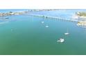 Aerial view showing bridge and boats at 610 Fox St, Longboat Key, FL 34228