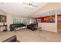 Spacious living room with vaulted ceilings and ample natural light at 11847 Dunster Ln, Parrish, FL 34219