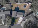 Bird's eye view of house, yard, and pool at 1008 Highgrove Ct, Valrico, FL 33596