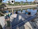 Private dock with wooden deck, perfect for relaxing or boating at 10436 Raymond St, Englewood, FL 34224
