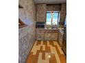 Kitchen features laminate countertops and wood flooring at 2700 9Th N Ave, St Petersburg, FL 33713