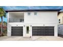 Two-car garage with a studio apartment above at 816 46Th N Ave, St Petersburg, FL 33703