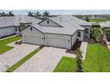 Two-story home with two-car garage and paver driveway at 18178 Cherished Loop, Bradenton, FL 34211