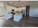 Modern kitchen with granite countertops and stainless steel appliances at 9585 Calumet Blvd, Port Charlotte, FL 33981