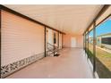 Spacious covered carport area with access to the home at 313 Mariner Dr, North Port, FL 34287